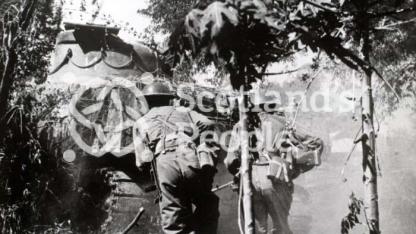 Tank and infantryman, Far East, c 1944