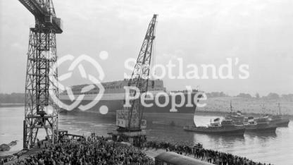 RMS Queen Elizabeth 2 on River Clyde after launch, 1967