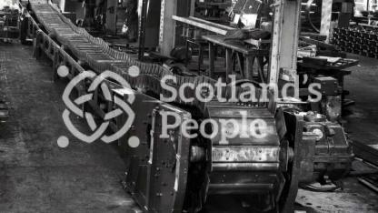 Conveyor belt in workshop, 1960s