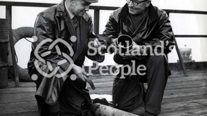 Men on sea boring tower in Forth, c 1955