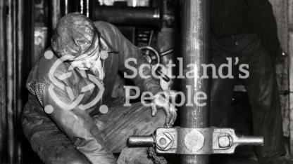 Men working on a boring tower in the Forth, 1955