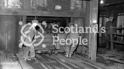 Miners with coal wagons at Glencraig Colliery