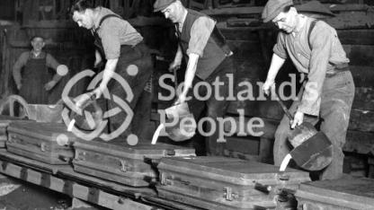 Filling moulds at Carron Works, 20th century