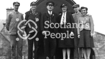 Railway staff on front footplate of locomotive, 1943
