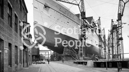 The Canadian Pacific Line ocean liner the RMS Empress of Britain on stocks showing the forward poppets