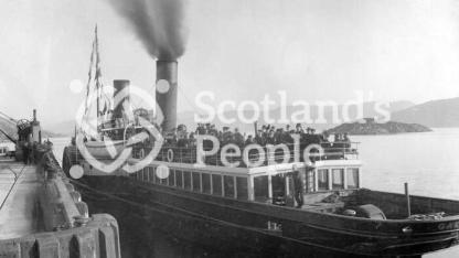 A paddle steamer at Kyle of Lochalsh pier about to sail to Skye