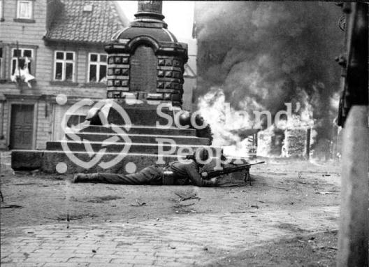 A gunner takes cover during the battle for the Rhine April 1945