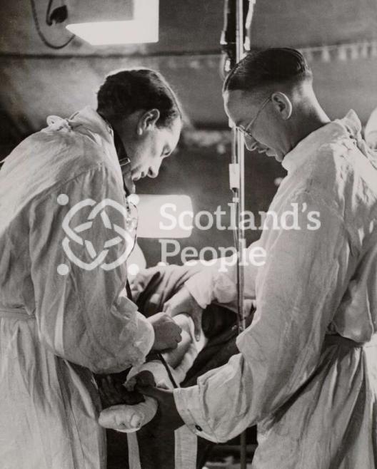Wounded soldier receiving blood transfusion at a casualty clearing station in Normandy, 1944
