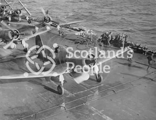 Fighter bomber taking off from carrier, 1944