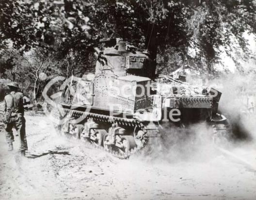 Tank and infantryman, Far East, c 1944