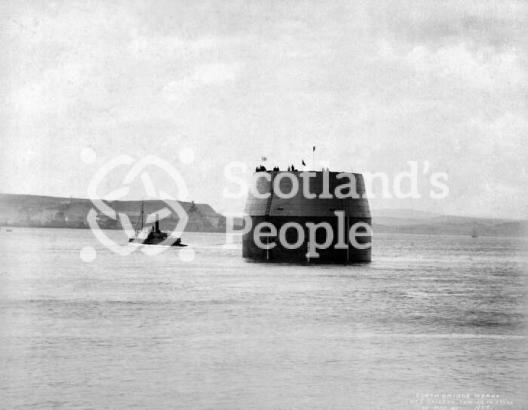 Forth Bridge caisson towed by tug, 1885