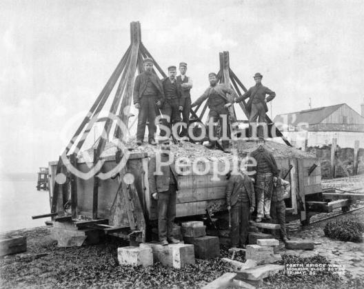 Forth Bridge workers on mooring block, 1885