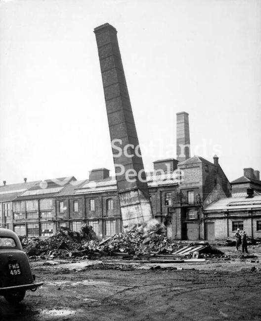 Chimney collapsing, Carron Works, 20th century