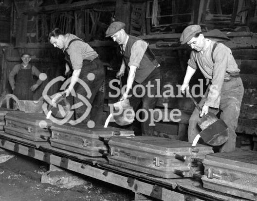 Filling moulds at Carron Works, 20th century