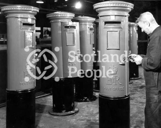 Fitting locks to pillar boxes, c 1952