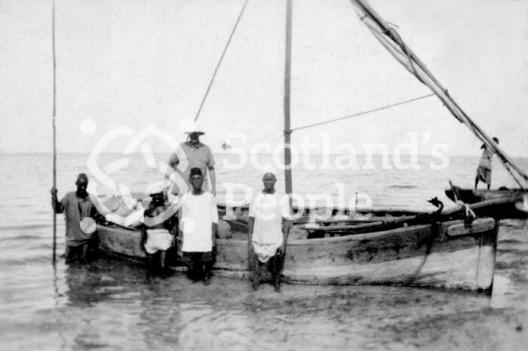 Boat's crew on a fishing trip to Coral Island off Tanzanian Coast