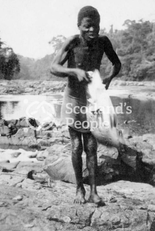A Cameroonian with a goose near Bakebbi, Cameroon