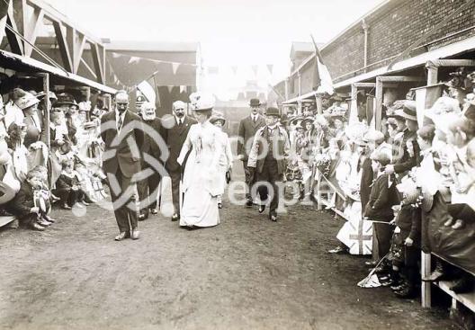 Queen Mary greeted by the crowd