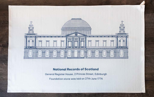 Tea towel in neutral colour with a navy hand drawn illustration of General Register House in Edinburgh