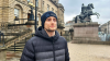 Image of a man wearing a Scotland's People Beanie Hat